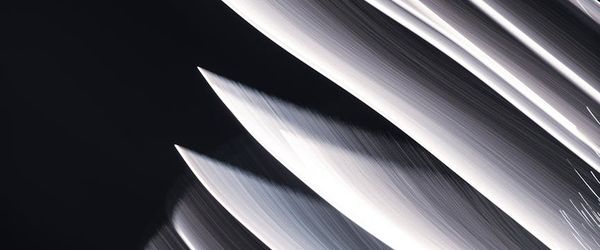 Abstract motion blur image suggesting rhythmic movement and energy flow.